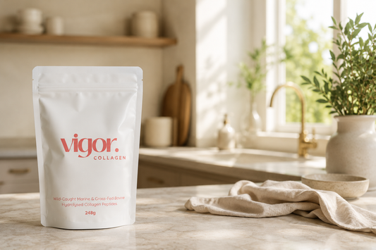 Vigor Collagen pouch on a kitchen counter with a tea towel next to it - Pure Blend of Wild-Caught Marine & Grass Fed Bovine Collagen Peptides