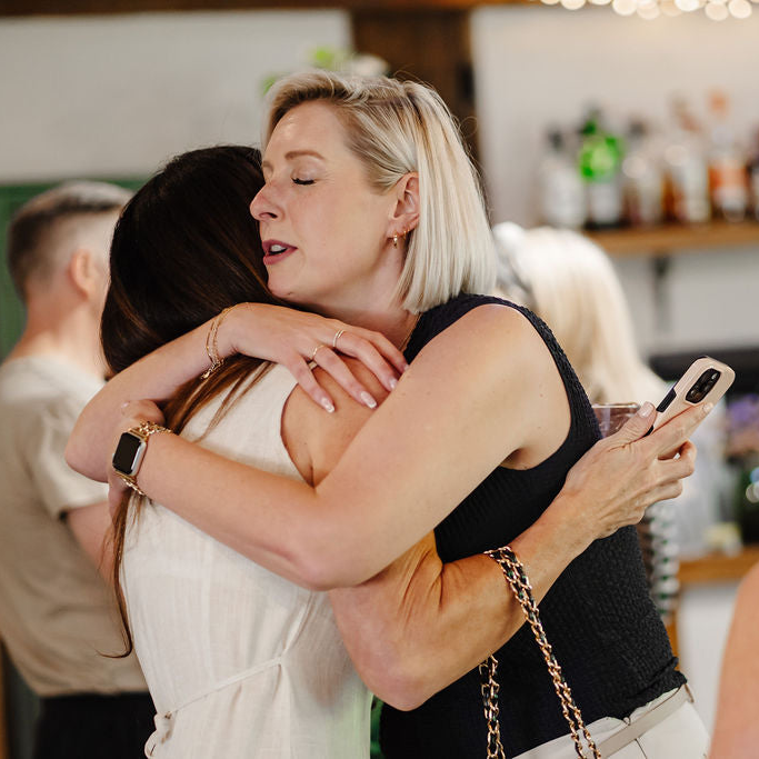Rachel Beck founder of Vigor Vitamins hugs Rebecca Walsh at Collagen Launch