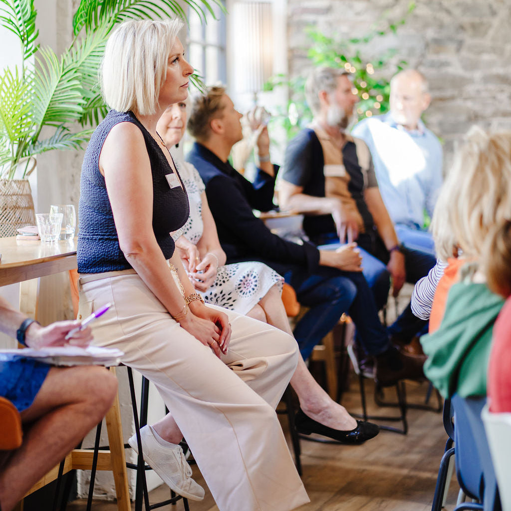 Rachel Beck listening to speakers at Vigor Vitamins Collagen Launch event.