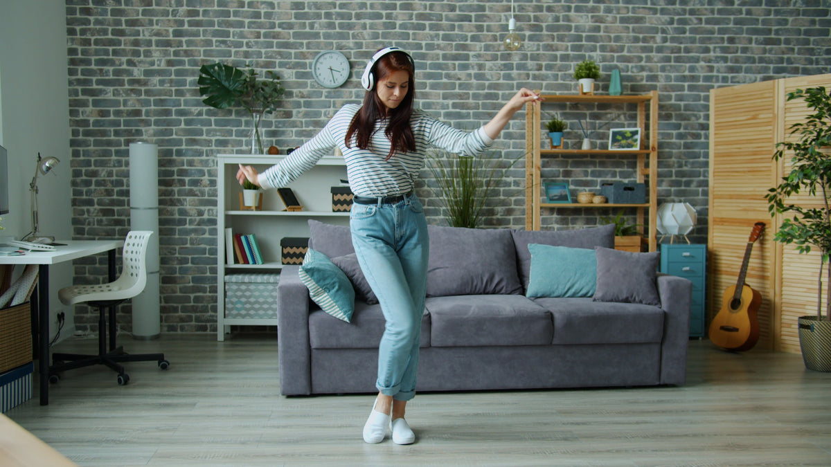 Vigor Vitamins - healthy woman moving and dancing